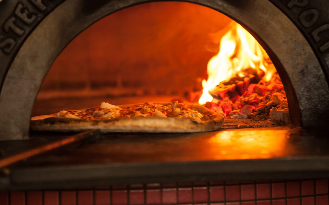 How to Use Your Wood Pizza Oven for Entertainment This Winter